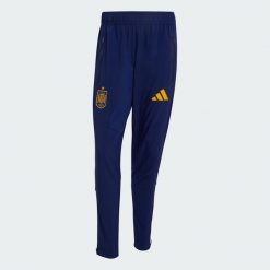 Spodnie Hiszpania Tiro Travel. Niebieskie spodnie sportowe męskie Adidas, m, bez wzorów, z elastanu, do biegania. Za 329.00 zł.