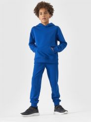 4F Spodnie dresowe joggery chłopięce - niebieskie 152 (11-12 lat). Niebieskie spodnie sportowe dla chłopców 4f, bez wzorów, z bawełny, sportowe. Za 69.99 zł.