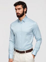 Klasyczna męska koszula SLIM FIT z satynowej tkaniny – niebieska V2 - Rozmiar: XXL. Niebieskie koszule męskie Ombre Clothing, m, bez wzorów, z bawełny, biznesowe, bez kołnierzyka, bez ramiączek. W wyprzedaży za 139.99 zł.