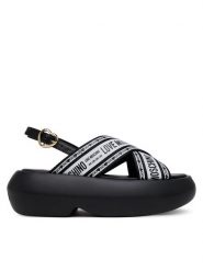 LOVE MOSCHINO Sandały JA16207I0MIX200A Czarny. Czarne sandały damskie Love Moschino, bez wzorów, z materiału, bez obcasa, na koturnie, bez zapięcia. Za 569.99 zł.