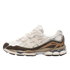 Buty do chodzenia dla dorosłych ASICS Gel-NYC Cream Mocha. Białe obuwie sportowe damskie Asics, bez wzorów, ze skóry, tenisowe. Za 1,676.41 zł.
