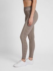 Damskie legginsy ze średnim stanem Hummel TE Christel. Szare legginsy sportowe damskie Hummel, xs, bez wzorów, z dzianiny, na fitness i siłownię. Za 184.00 zł.