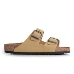 Klapki damskie Birkenstock Arizona. Żółte klapki damskie Birkenstock, bez wzorów, z materiału, eleganckie, bez obcasa. Za 425.35 zł.