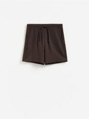Muślinowe szorty jogger - brązowy. Brązowe szorty męskie Reserved, l, bez wzorów, z bawełny. Za 99.99 zł.