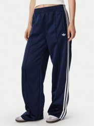 Adidas Spodnie dresowe Satin Sst Loose Trackpant KS7339 Granatowy Relaxed Fit. Niebieskie spodnie dresowe damskie Adidas, xs, bez wzorów, z dresówki. Za 349.99 zł.