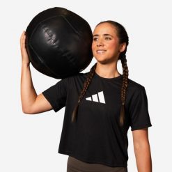Koszulka fitness damska ADIDAS. Czarne koszulki sportowe damskie Adidas, l, bez wzorów, z materiału, bez kołnierzyka, bez ramiączek, na fitness i siłownię. Za 99.99 zł.