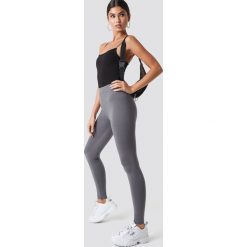 Nicki x NA-KD Legginsy z jerseyu - Grey. Szare legginsy damskie Nicki x NA-KD, z jersey. Za 100.95 zł.