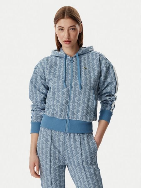 Lacoste Bluza SF7606 Niebieski Regular Fit. Niebieskie bluzy damskie Lacoste, bez wzorów, z syntetyku, bez kaptura. Za 521.99 zł.