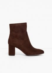 Krótkie botki marki Marco Tozzi z elastyczną cholewką. Brązowe botki damskie bonprix, bez obcasa, bez zapięcia. Za 249.99 zł.