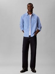 Calvin Klein Jeans koszula codzienna Mężczyźni Comfort Fit Bawełna (100%) niebieski, L. Niebieskie koszule męskie Calvin Klein Jeans, na lato, l, bez wzorów, z bawełny, eleganckie, bez kołnierzyka, bez ramiączek. Za 409.95 zł.