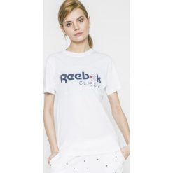 Reebok Classic - Top. Szare topy damskie Reebok Classic, z nadrukiem, z bawełny, z okrągłym kołnierzem, z krótkim rękawem. W wyprzedaży za 69.90 zł.