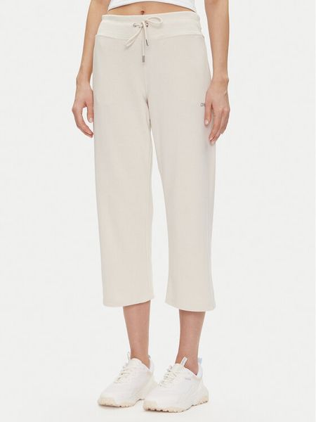 DKNY Sport Spodnie dresowe DP5P3624 Beżowy Regular Fit. Brązowe spodnie dresowe damskie DKNY Sport, m, bez wzorów, z bawełny. Za 169.99 zł.