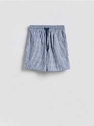 Bawełniane szorty piżamowe - niebieski. Niebieskie piżamy męskie Reserved, l, bez wzorów, z bawełny. Za 49.99 zł.