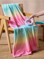 Koc dziecięcy i opaską z motywem jednorożca - wielobarwny. Kocyki dla dzieci Sinsay. Za 35.99 zł.