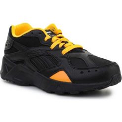 Buty Reebok x Gigi Hadid Aztrek AZDV6514 czarne. Czarne obuwie sportowe damskie bez wzorów, z materiału. Za 872.66 zł.