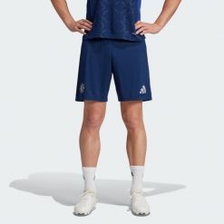 Szorty Manchester United 24/25 Away. Niebieskie krótkie spodenki sportowe męskie Adidas, s, bez wzorów, z materiału, do piłki nożnej. W wyprzedaży za 200.00 zł.