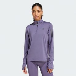Kurtka Own the Run Half-Zip. Fioletowe bluzy sportowe damskie Adidas, xs, bez wzorów, z materiału, bez kaptura, do biegania. Za 212.75 zł.
