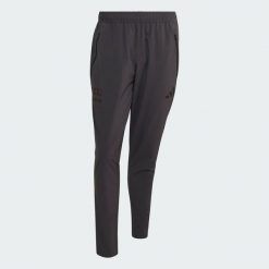 Spodnie Audi Revolut F1 Team Dna Vis Tech. Czarne spodnie materiałowe męskie Adidas, bez wzorów. Za 329.00 zł.