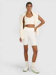 4F Legginsy kolarki treningowe bezszwowe damskie - beżowe XS/S. Brązowe legginsy damskie 4f, l, bez wzorów, z dzianiny, z podwyższonym stanem, krótkie, na fitness i siłownię. Za 119.99 zł.