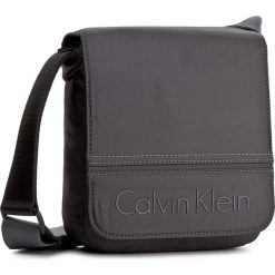 Saszetka CALVIN KLEIN - Matthew Reporter Wi K50K502894 009. Saszetki męskie marki Calvin Klein. W wyprzedaży za 229.00 zł.