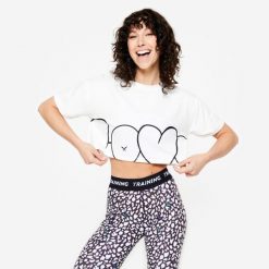 Koszulka fitness damska Domyos crop top loose. Koszulki sportowe damskie DOMYOS, l, bez wzorów, z bawełny, bez kołnierzyka, bez ramiączek, na fitness i siłownię. W wyprzedaży za 49.99 zł.