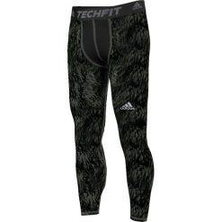 Adidas Legginsy Techfit Base Shards Graphic zielone r. S (S94430). Legginsy sportowe męskie marki Adidas. Za 130.96 zł.