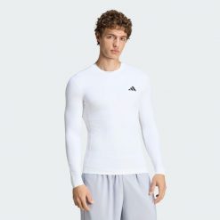 Koszulka PrimeLift Essentials Workout Long Sleeves. Białe bluzki z długim rękawem męskie Adidas, uniwersalny, bez wzorów, z dzianiny, bez kołnierzyka, bez ramiączek, na fitness i siłownię. Za 199.00 zł.