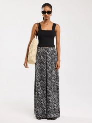 Spodnie damskie wide z wiskozy z motywem kwiatowym czarne Bohimi 906. Czarne spodnie materiałowe damskie Big Star, l, bez wzorów, z denimu. W wyprzedaży za 159.99 zł.