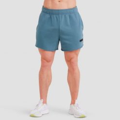 Szorty męskie fitness luźne niebieskie Unity. Niebieskie krótkie spodenki sportowe męskie GYMBEAM, m, bez wzorów, z bawełny, na fitness i siłownię. Za 76.90 zł.