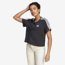 Koszulka damska ADIDAS Gym & Pilates crop. Białe koszulki sportowe damskie Adidas, s, bez wzorów, z bawełny, bez kołnierzyka, bez ramiączek, na fitness i siłownię. Za 99.99 zł.