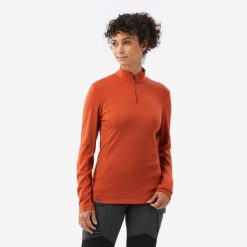 Koszulka trekkingowa damska z długim rękawem Merino Resist. Koszulki sportowe damskie SIMOND, m, bez wzorów, z materiału, sportowe, bez kołnierzyka. Za 249.99 zł.