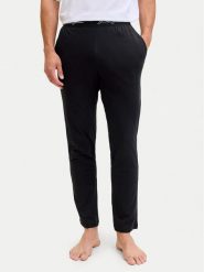 Jack & Jones Spodnie piżamowe Clyde 12291501 Czarny Regular Fit. Czarne piżamy męskie Jack & Jones, m, bez wzorów, z bawełny. Za 79.99 zł.