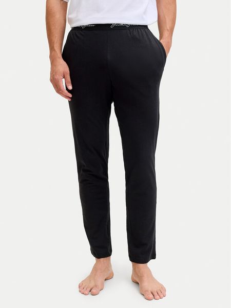 Jack & Jones Spodnie piżamowe Clyde 12291501 Czarny Regular Fit. Czarne piżamy męskie Jack & Jones, m, bez wzorów, z bawełny. Za 79.99 zł.