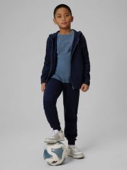 4F Spodnie dresowe joggery chłopięce - granatowe 164 (13-14 lat). Niebieskie spodnie sportowe dla chłopców 4f, bez wzorów, z dresówki, sportowe. Za 79.99 zł.