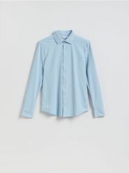 Koszula super slim fit - jasnoniebieski. Niebieskie koszule męskie Reserved, l, bez wzorów, z dzianiny, bez kołnierzyka, bez ramiączek. Za 119.99 zł.
