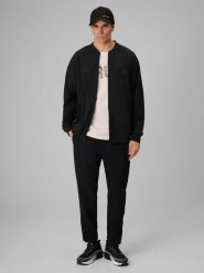 4F Spodnie casual męskie 4F x Robert Lewandowski - czarne XXL. Czarne spodnie sportowe męskie 4f, m, bez wzorów, z tkaniny, na fitness i siłownię. Za 229.99 zł.