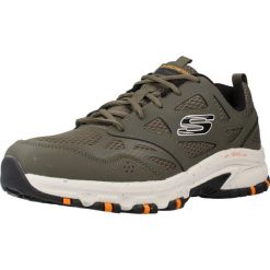 Buty SKECHERS HILLCREST Zielony. Zielone buty sportowe męskie Skechers, z tkaniny, bez zapięcia, do piłki nożnej, Skechers Sport. Za 341.57 zł.