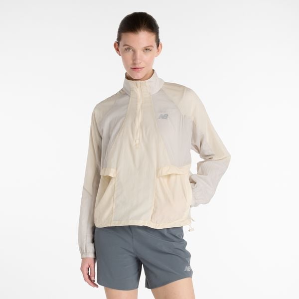Kurtka damska New Balance WO53206LIN – beżowa. Brązowe kurtki damskie New Balance, m, bez wzorów, z materiału, bez kaptura. Za 539.99 zł.