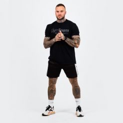 Koszulka męska fitness krótki rękaw czarna Beyond Limits. Czarne koszulki sportowe męskie GYMBEAM, m, bez wzorów, z bawełny, bez kołnierzyka, bez ramiączek, na fitness i siłownię. Za 42.90 zł.