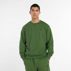 Bluza męska New Balance MT41506DAE – zielona. Zielone bluzy męskie New Balance, l, z aplikacjami, z bawełny, bez kaptura. Za 359.99 zł.