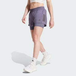 Szorty Own the Run Climacool 2-in-1. Fioletowe obuwie sportowe damskie Adidas, bez wzorów, sportowe, na fitness i siłownię, climacool (adidas). Za 191.50 zł.