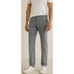 Mango Man - Spodnie Barna3. Eleganckie spodnie męskie marki Giacomo Conti. W wyprzedaży za 99.90 zł.