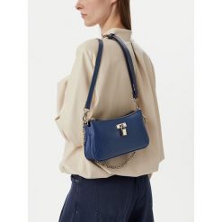 Torebka Nine West. Niebieskie torebki do ręki damskie Nine West, bez wzorów, klasyczne, bez dodatków. Za 229.99 zł.
