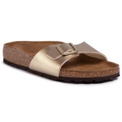 Klapki Birkenstock. Żółte klapki damskie Birkenstock, bez wzorów, bez obcasa. Za 279.99 zł.