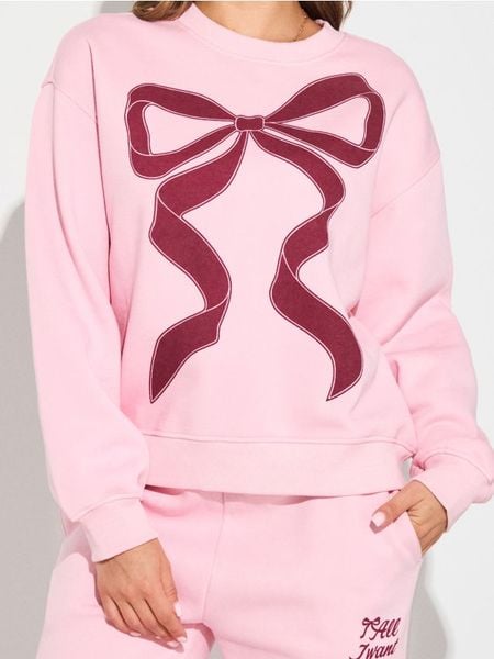 Bluza crewneck z nadrukiem - różowy. Czerwone bluzy damskie Sinsay, l, bez wzorów, bez kaptura. Za 49.99 zł.