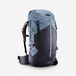Plecak trekkingowy damski Simond MT100 Easyfit 60 litrów. Niebieskie plecaki damskie SIMOND, bez wzorów, z materiału, klasyczne. Za 349.99 zł.