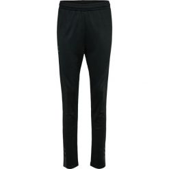 Damskie spodnie dresowe Hummel Active. Czarne spodnie dresowe damskie Hummel, bez wzorów, z dresówki. Za 263.00 zł.