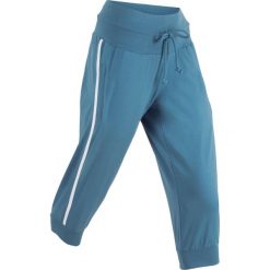 Spodnie sportowe 3/4 bonprix niebieski dżins. Niebieskie spodnie dresowe damskie bonprix. Za 59.99 zł.