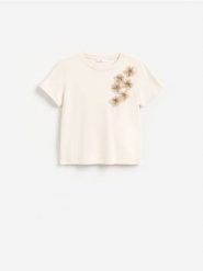 T-shirt z ozdobnymi aplikacjami - kremowy. Białe t-shirty damskie Reserved, l, z aplikacjami, z bawełny, bez kołnierzyka. Za 79.99 zł.