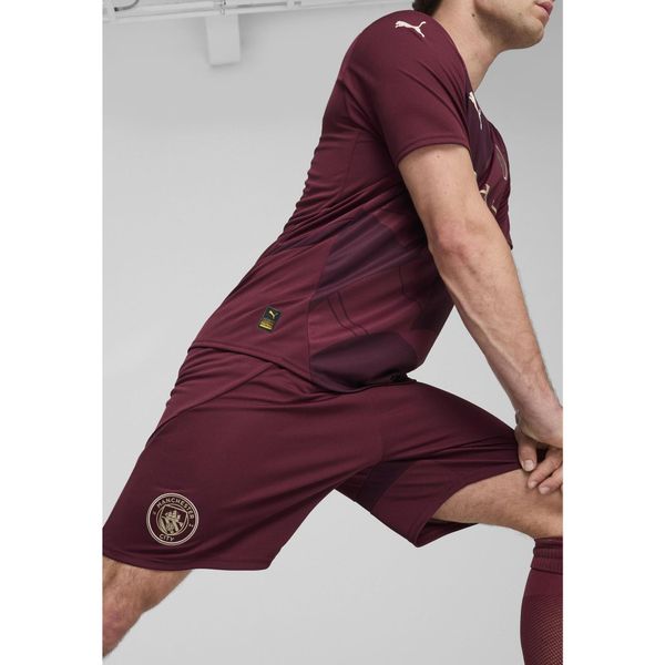 Męskie szorty Manchester City 24/25 PUMA Dark Jasper Red. Czerwone krótkie spodenki sportowe męskie Puma, m, bez wzorów, do piłki nożnej. W wyprzedaży za 176.35 zł.